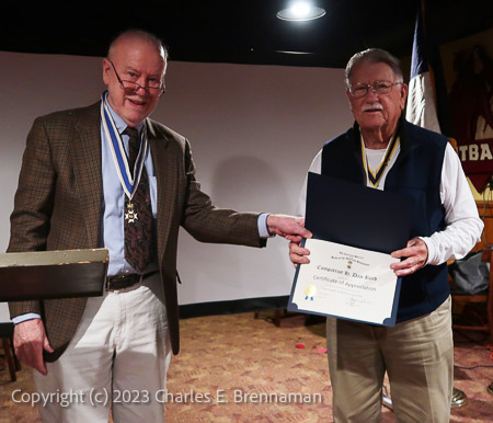 John Ray receives a Certificate of Appreciation for his service on the B.O.M. for 2022.